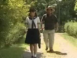 Japanese hottie gets banged by rough threesome